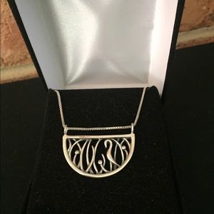 “Bird in the marsh” sterling silver necklace.